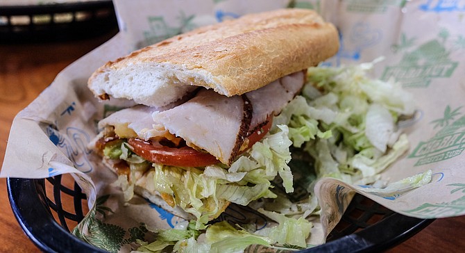 Half of a 12-inch "blunt" of "Kali Mist," a.k.a. California club sandwich at Cheba Hut.