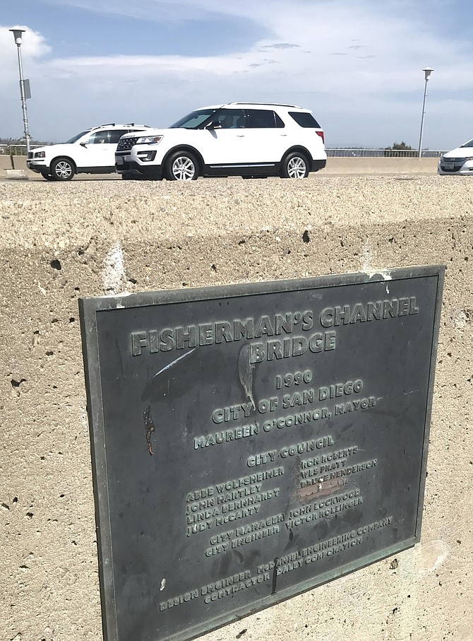 The plaque commemorated the building of the bridge in 1990. 