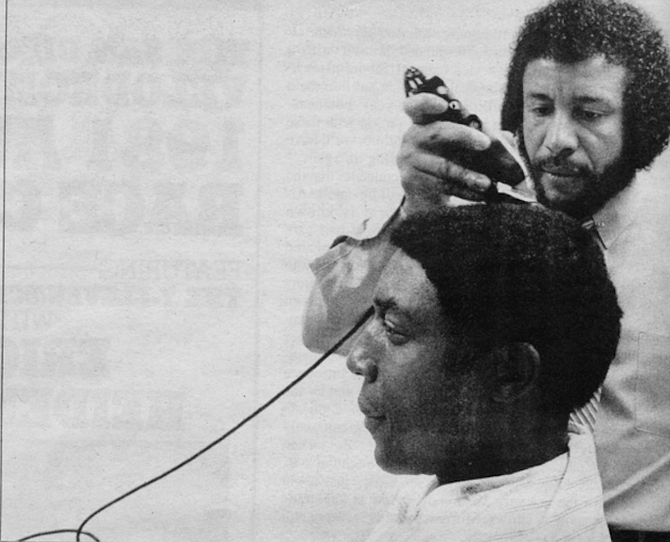 Willie Morrow cutting Willie McCovey. hair