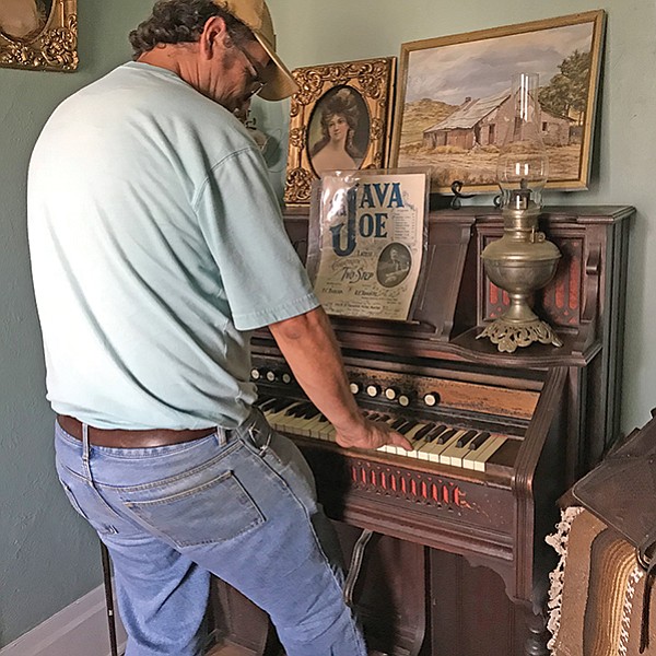 Christopher Pro, caretaker and historian, plays the Steins’ foot-pumped organ