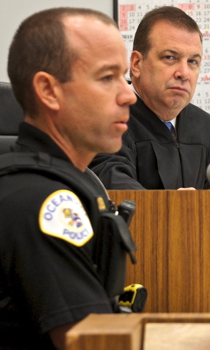 Officer Ruedi and judge Bowman. Photo by Eva Knott