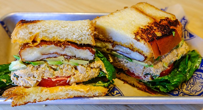 Spicy smoked tuna sandwich with griddled cheese