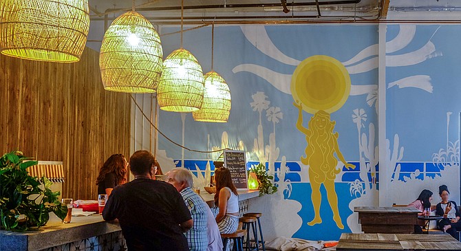 A mural depicting the Greek goddess Helia, at newly opened Helia Brewing.