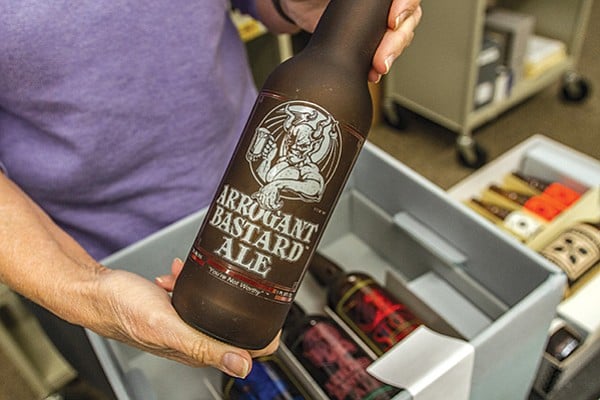 An old Arrogant Bastard Ale bottle, in the collection at the Cal State San Marcos Brewchives