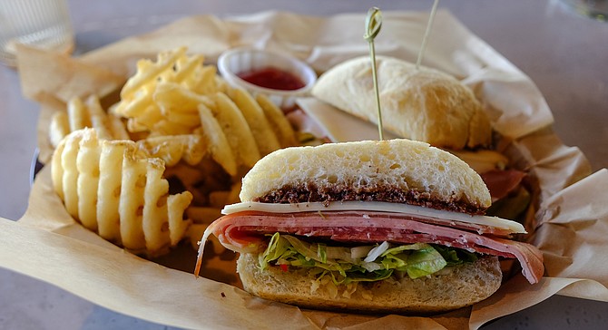 The muffuletta uses Italian deli meats, but was invented in New Orleans.
