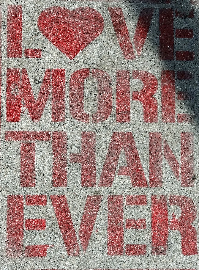 Stenciled message on a 30th St. sidewalk in North Park.  The right appeal for these turbulent times.