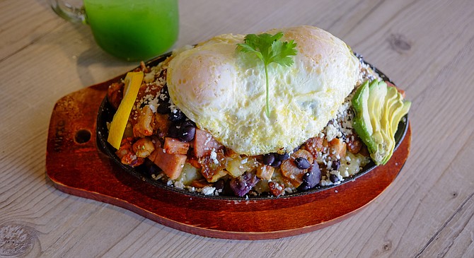 A breakfast hash combining Mexican, Filipino, and American cuisines