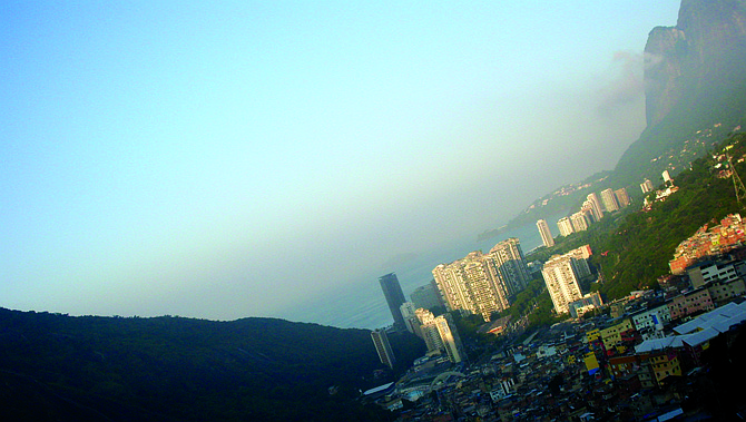 #01 - 'The city's contrasts with a favela adjacent to wealthy condos'.