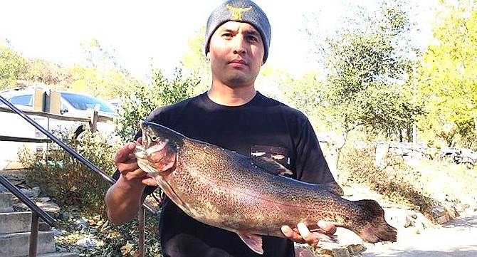 Gabriel Lerma with his 8.5 pound trout caught on the second day of the season.