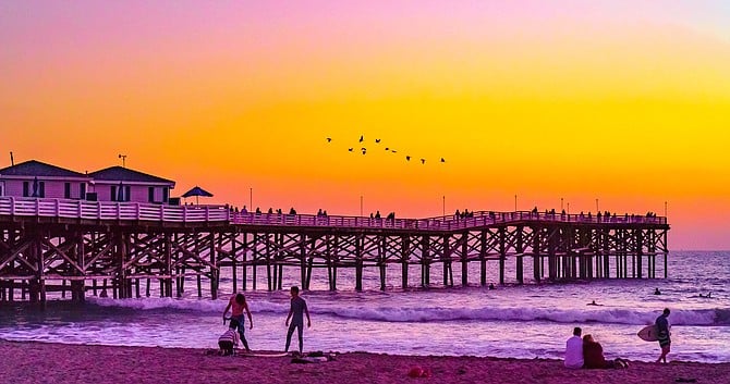 Surfers and a flock by Crystal Pier - by McClean Photography