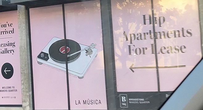 The “Hip apartments for lease” sign