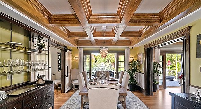 Empty your coffers and become the owner of this sweet coffered ceiling.
