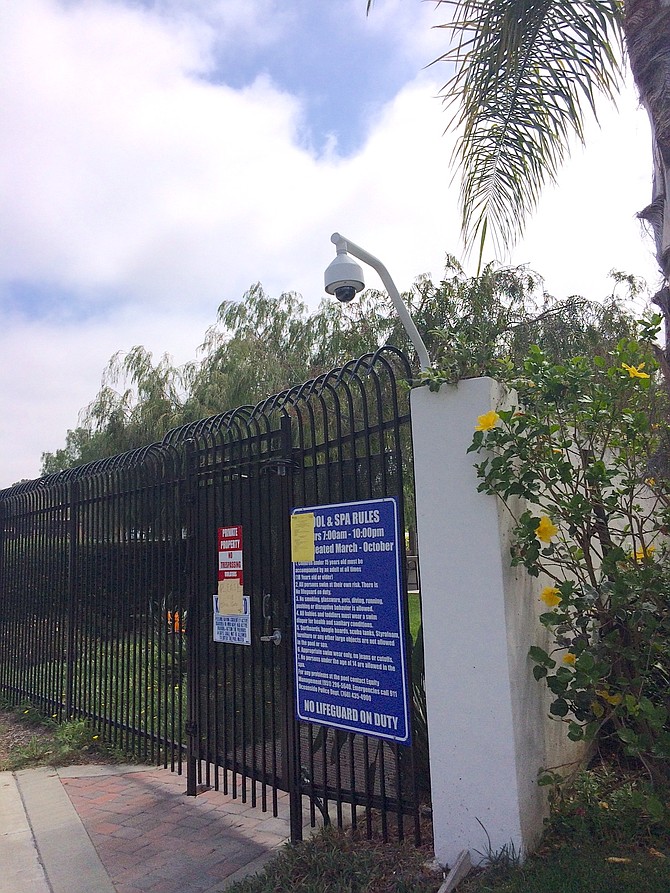 There was a public pool near Herbert's home, with cameras