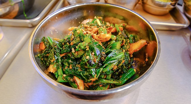A stir fry of mostly Chinese broccoli