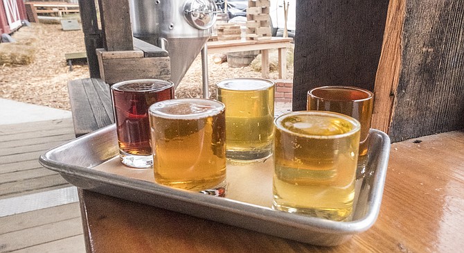 The colors in a flight of beer seem autumnal when drinking in the mountains.