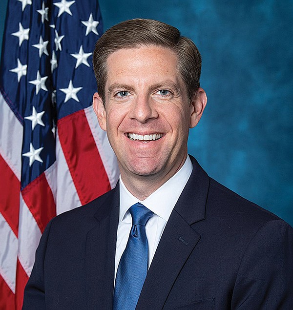 Mike Levin is smiling because the freshman congressman is already enjoying lobbyist-funded free travel.