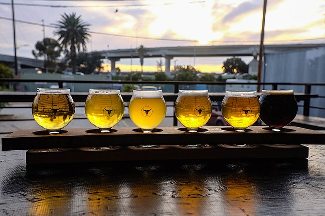 The view from Alta Brewing, including a flight of its beers