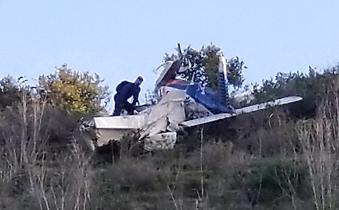 The single engine plane crashed into a ridge about 125 feet above Highway 76.