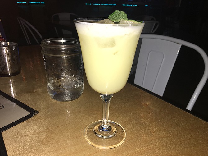 The Thai Me Up combines Scorpion Pepper Vodka with curry powder, lime juice, orange juice, coconut cream and pineapple.