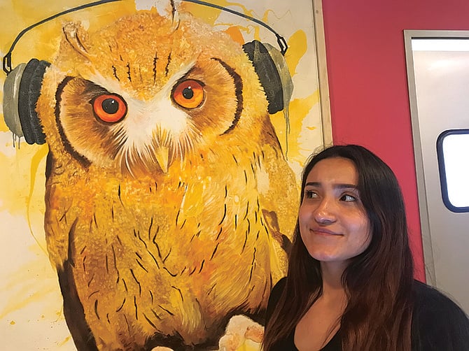 Aubri, and her front desk friend, owl by Paco