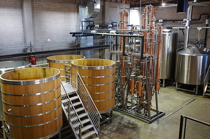 The Storyhouse Spirits distiller, from left to right: oak foedres, a continuous copper still, and stainless steel mash tun.
