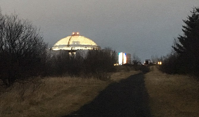 Approaching Reykjavik's Perlan Museum at night.