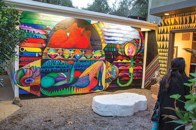 A mural by artist in residence Karl Ranson at A Ship in the Woods