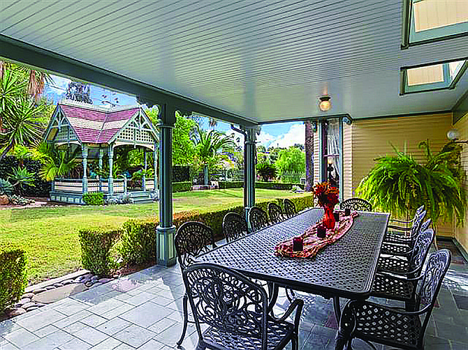 Patio with view of the elaborate and award-winning Swiss Victorian gazebo