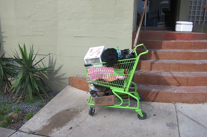 After Shelly drops off her stuff at the storage facility, she still keeps her shopping cart in tow. She bought this one from another homeless person.