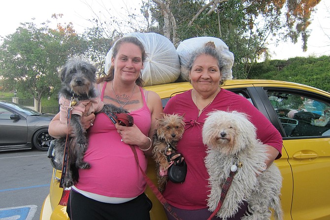 Alexandra Jones and Sandra Benavides and dogs Princess, Bebe, and Lula.