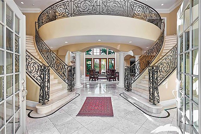 Carmona’s double grand staircase entryway