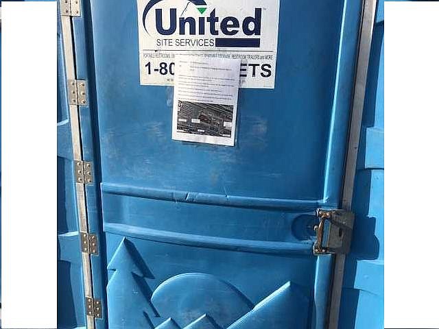 The portable toilet information board.