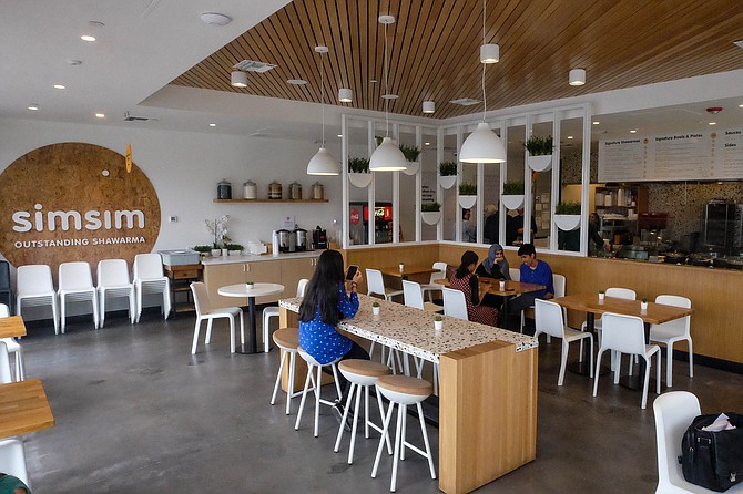 Simsim's fast casual interior design by Bells & Whistles