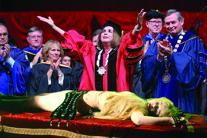 Priestess-President Della Torrid welcomes “a new spirit of empowerment and opportunity on the campus of SDSU” as she prepares to offer it the sacrifice of “Wypipo,” a “living embodiment of white privilege and oppression” formerly known as captain of the SDSU football cheerleading squad Stacey Summers. Behind her (right), Academic Dean James Highmighty applauds the action, which both secured Della Torrid’s position from now until the Fourth Dread Dominion and kicked off a diversity initiative designed to make Latinx students feel more welcome on campus, though afterwards he admitted he was glad to be wearing his protective Amulet of Tenure.