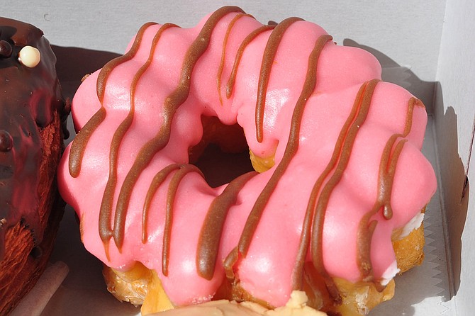 A Pink Zebra French ruler: strawberry glazed with a chocolate drizzle