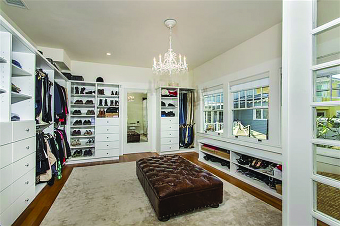 Square footage is nice, but what really makes a master closet a master closet is a chandelier.