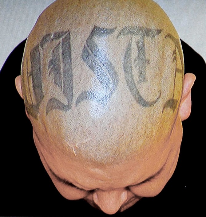 VISTA tattoo across top of Sorto's head, when he was arrested. Vista Home Boy.