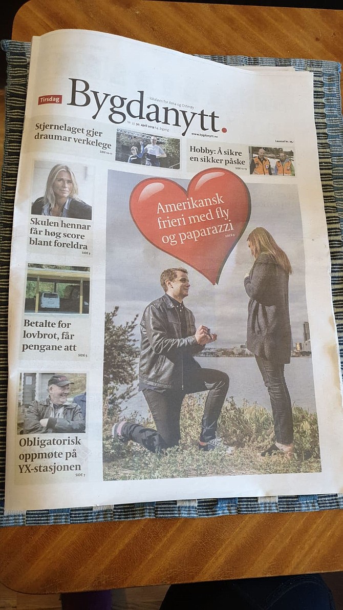 Cover page of the Norwegian "Bygdanytt". Translated to "Village news". In the heart it says "American engagement with airplane and paparazzi".