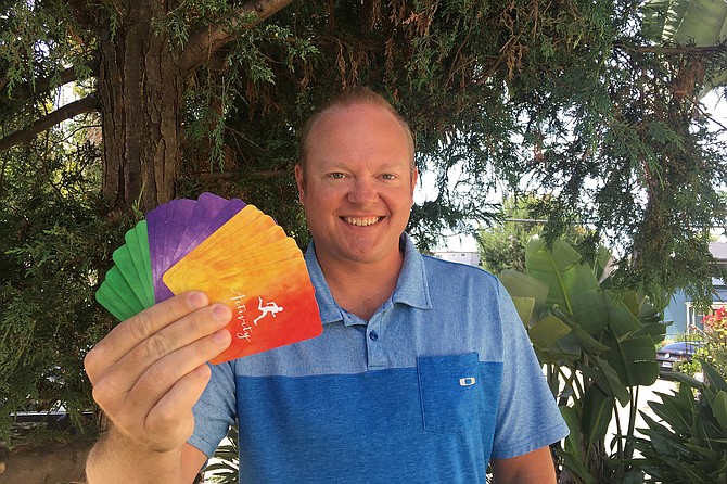 Pocket positivity: Jeff Holland and his Coping Cards.