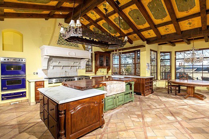 The kitchen’s ornately detailed exposed-beam ceiling.