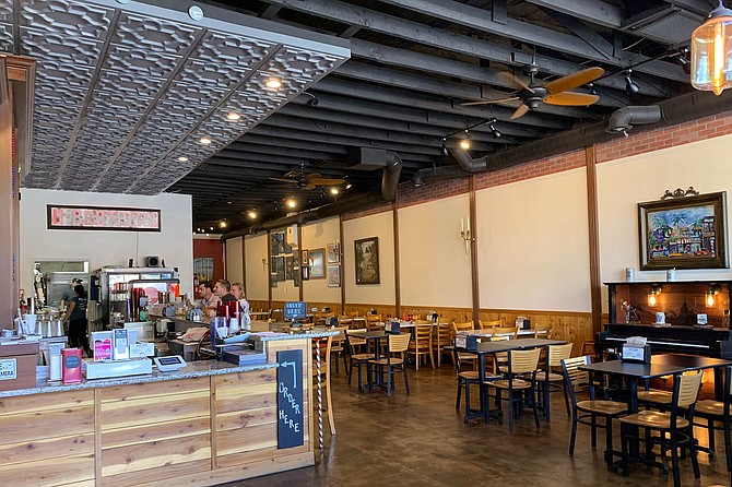 A piano art piece and tin ceiling tiles add style to this Escondido gastropub.