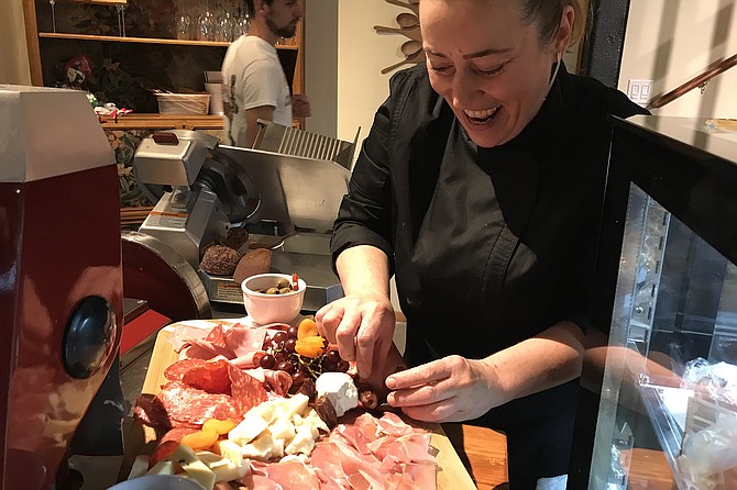 Chef and co-owner Francesca puts together meats, cheeses and fruits ($10 per person)