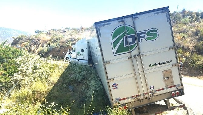 DFS truck. “That is not a through route for a tractor with a 53′ trailer." - Image by Augie