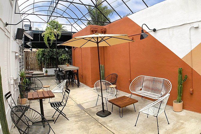 The back patio at Yerba Mate Bar lets customers sit outside, away from the street life on Garnet Avenue.