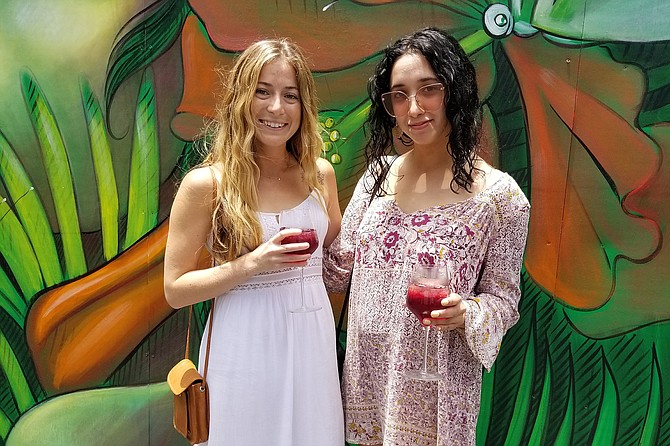 Ansley (left) and Gaby (right) accessorize their bohemian brunch style with sangria