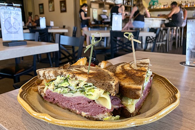 A reuben with house-cured corned beef and Brussels sprout slaw