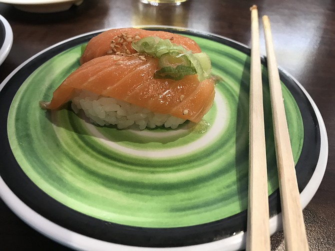 My umami oil salmon nigiri: sesame flavors