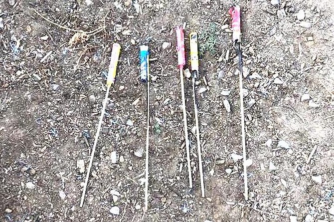 Wade sent me photos of five bottle rockets that landed in his property.