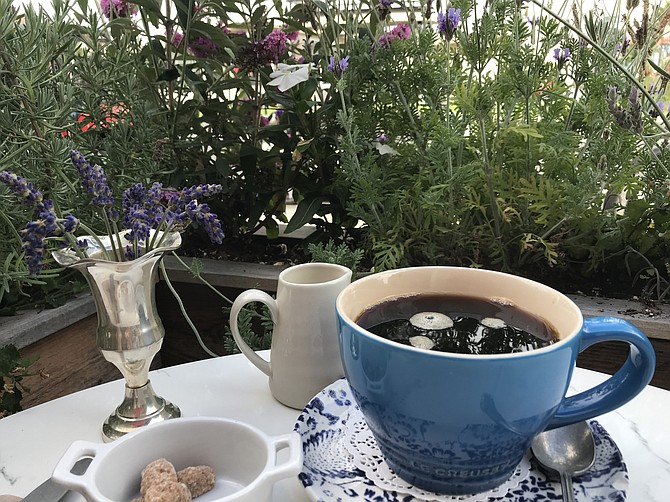 Nice big French cups keep $3 coffee steaming in an herbal garden