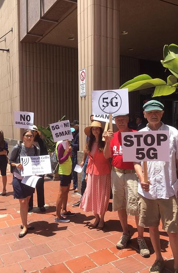 Stop 5G rally on July  23. "Worst of all, there are 'zero setbacks from residences.' "